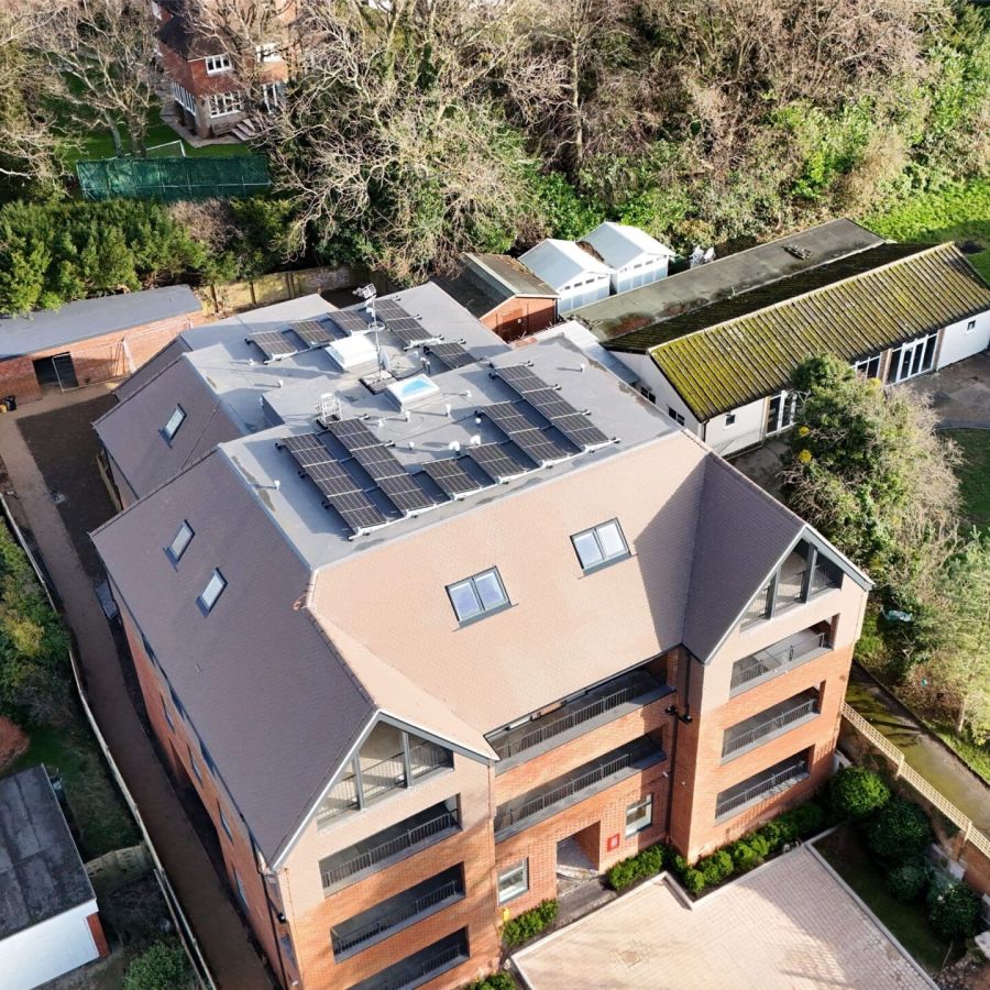 Engineers maintaining renewable systems in social housing