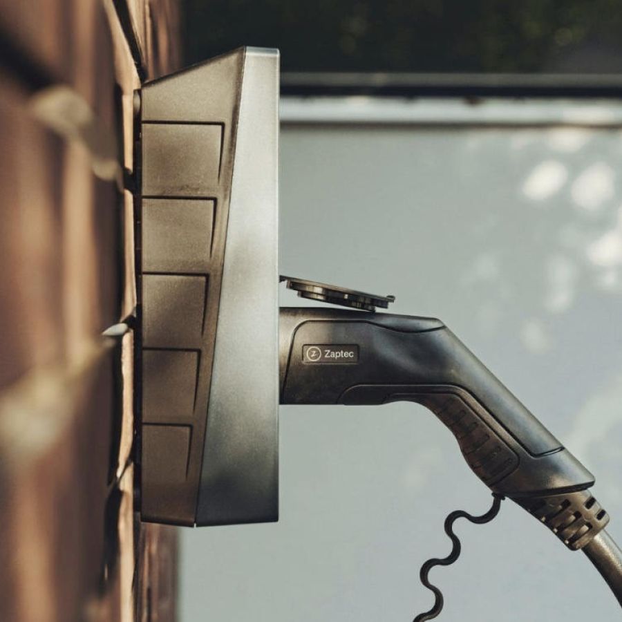 Technician installing an EV charging station for effortless setup