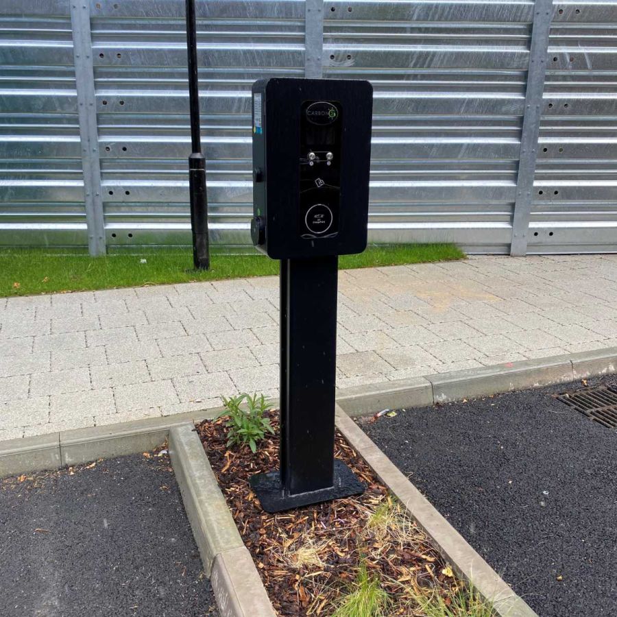 EV charging infrastructure for transport fleets powered by solar carports and rooftop solar energy.