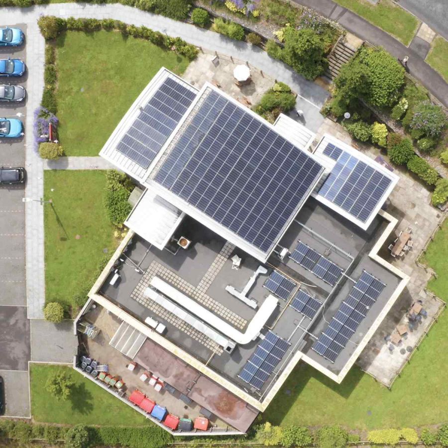 Solar panel installation on commercial building by Carbon3