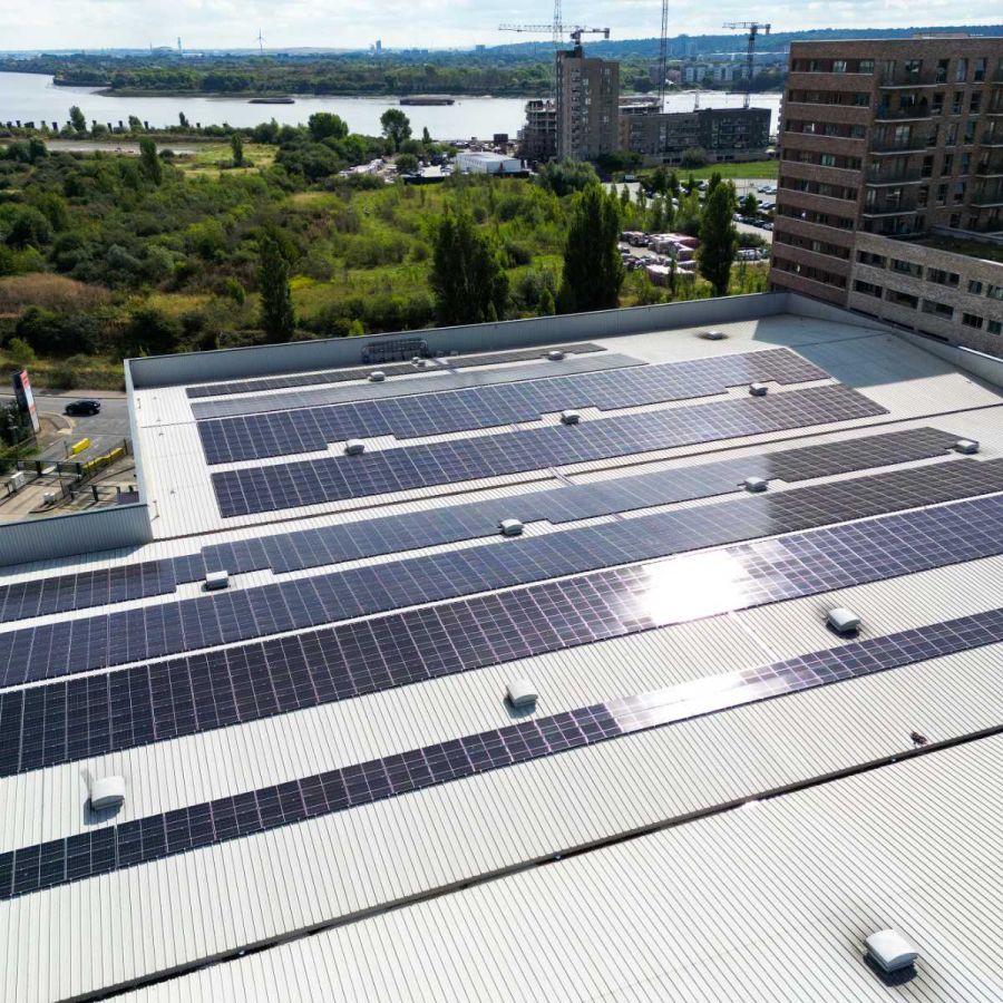 Commercial solar panels reducing energy costs at a warehouse
