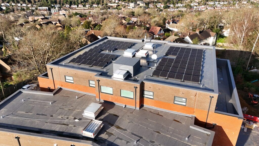 South facing flat roof solar panels on new build social housing