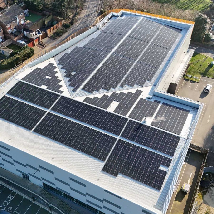 Engineer inspections and maintaining solar panels at a leisure centre