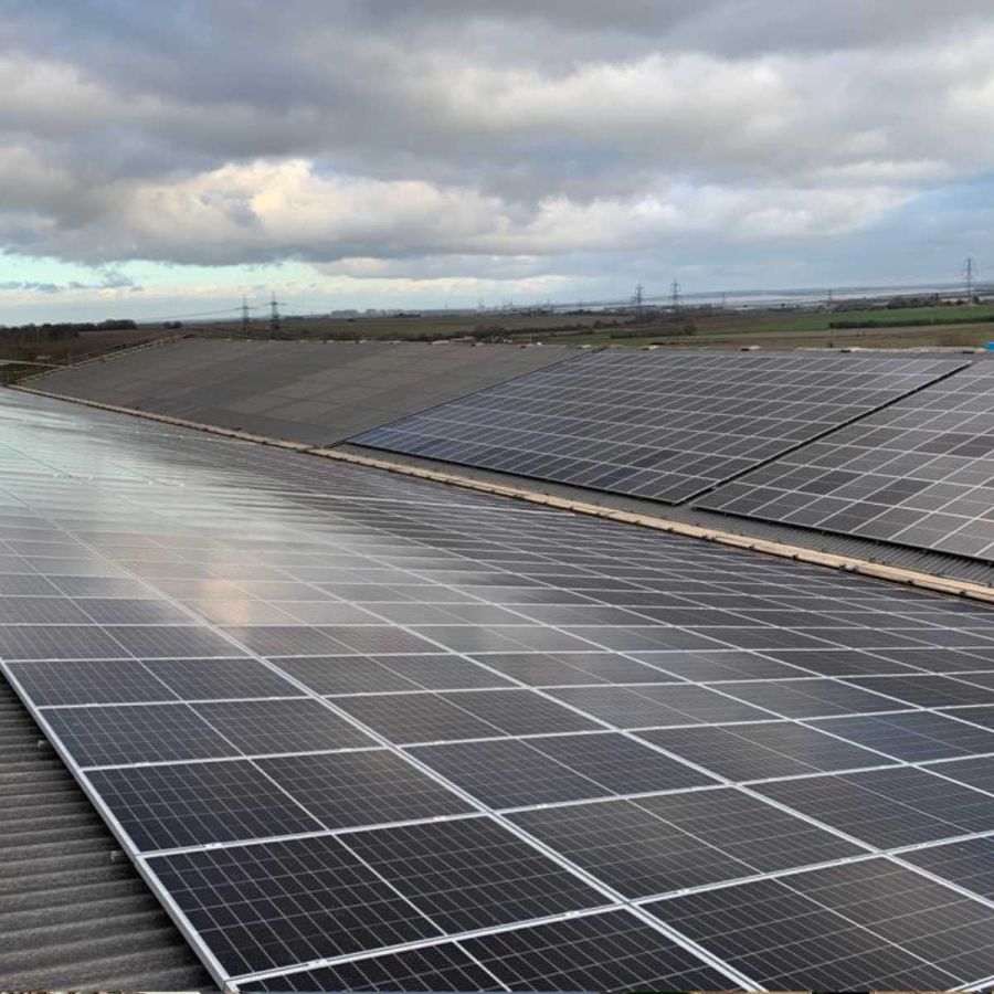 Solar PV installed on a large transport warehouse roof