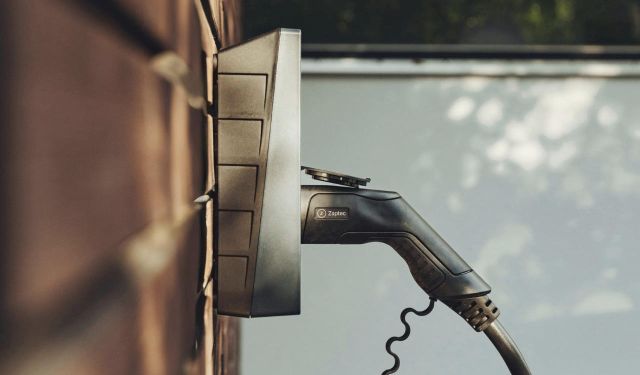 Technician installing an EV charging station for effortless setup